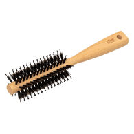 Escova de cabelo bege em madeira