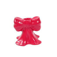 Castiçal em forma de laço vermelho