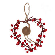 Coroa de natal em forma de cora&ccedil;&atilde;o com bagas