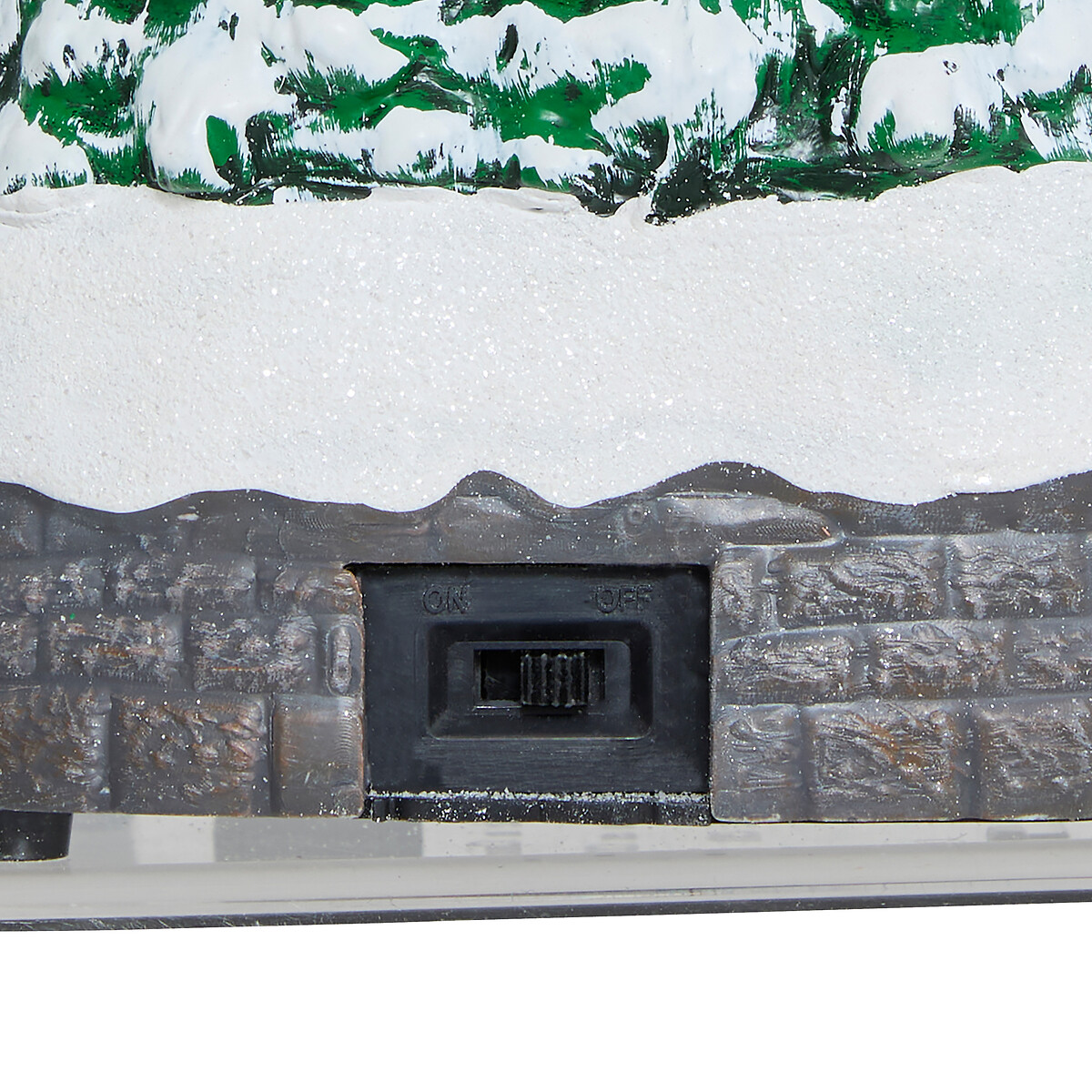 Aldeia natalícia luminosa com casa e túnel