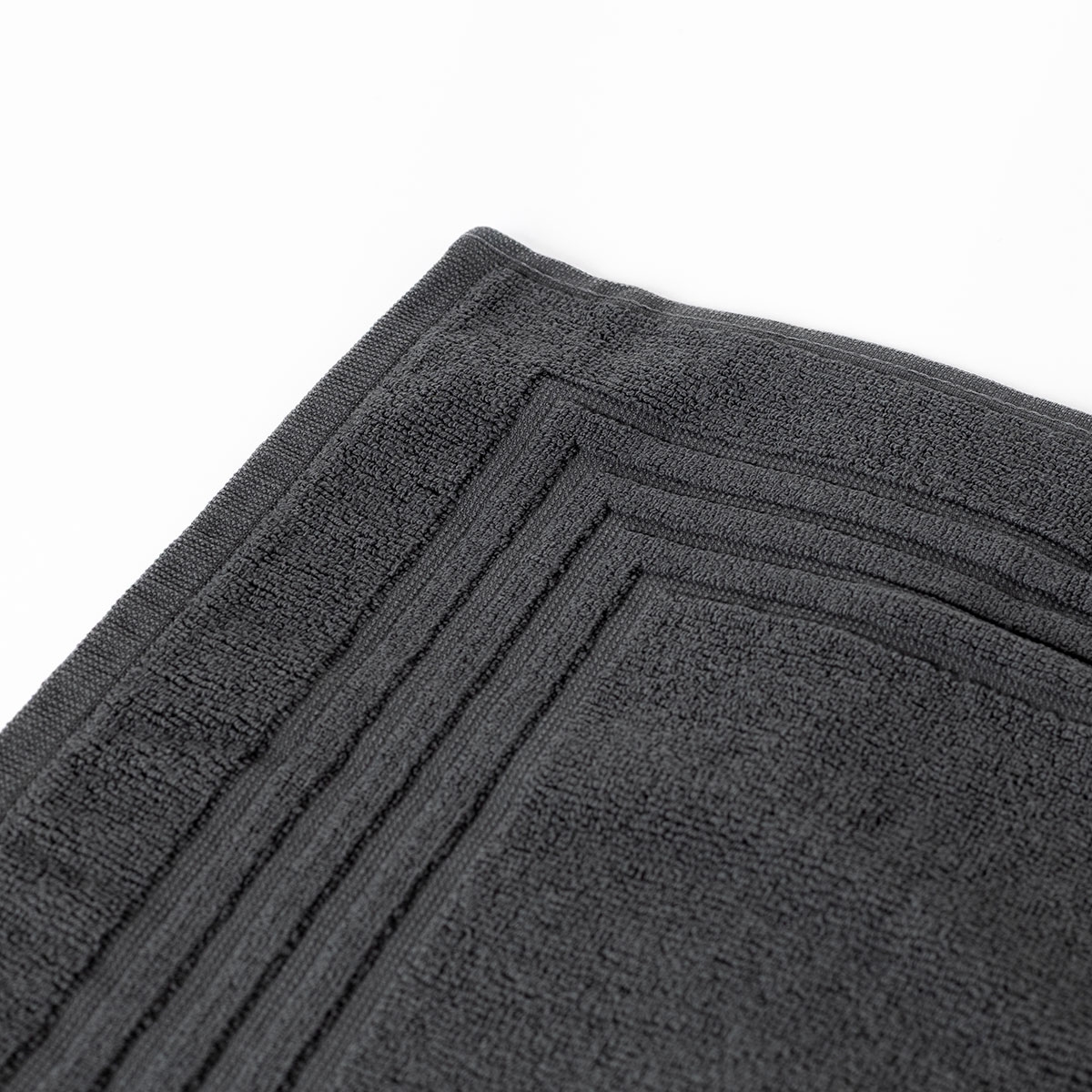 Tapete sa&iacute;da de banho ESSENZA cinza escuro 50x70cm