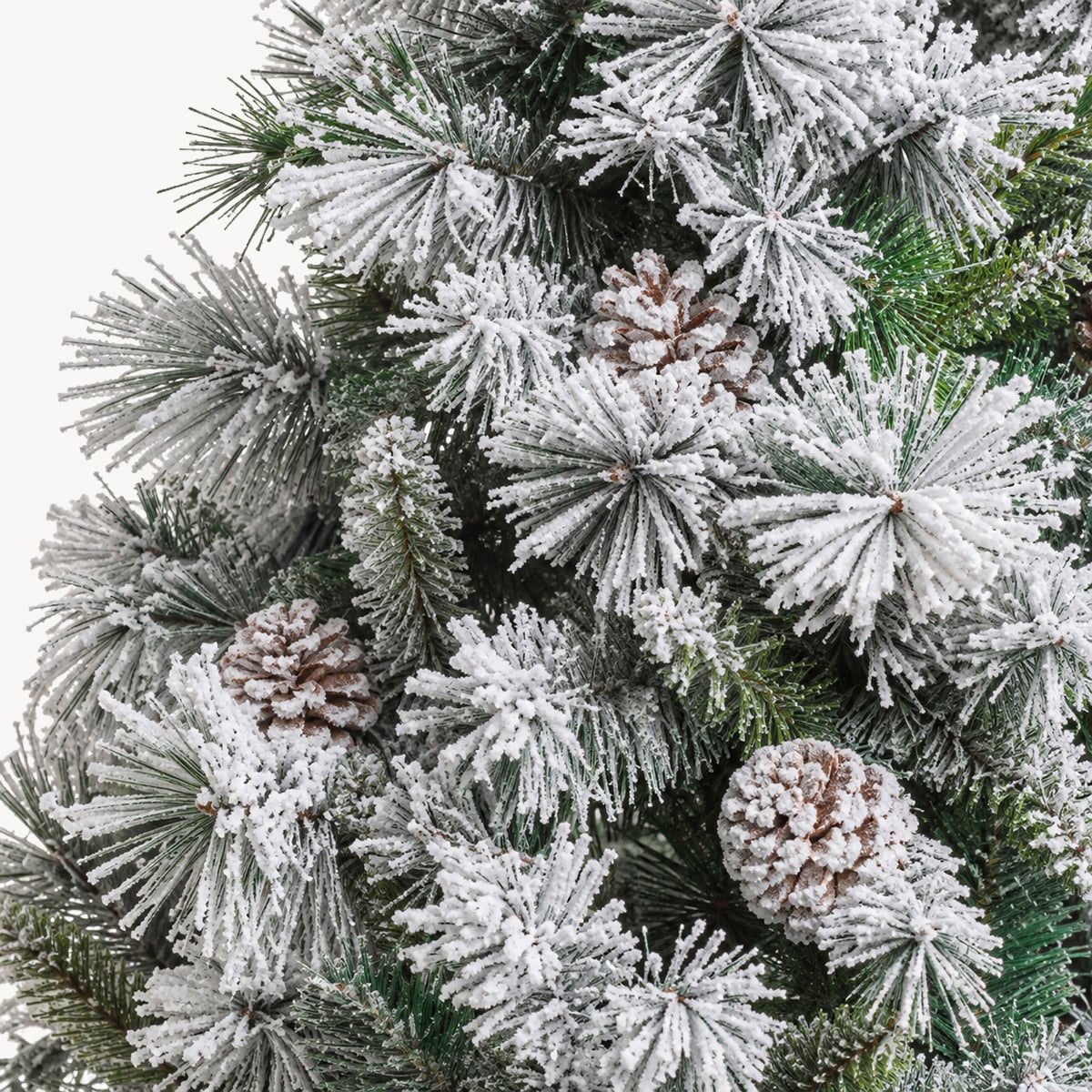 &Aacute;rvore de natal MINNESOTA efeito neve com pinhas 210cm
