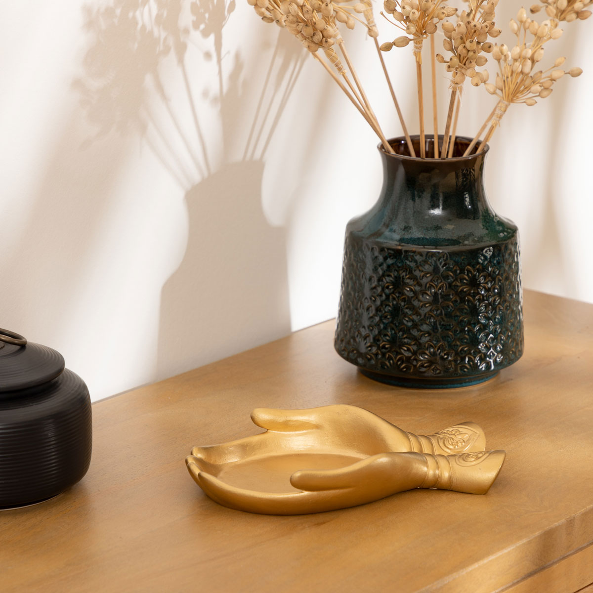 Despeja bolsos JIL dourado em forma de mãos