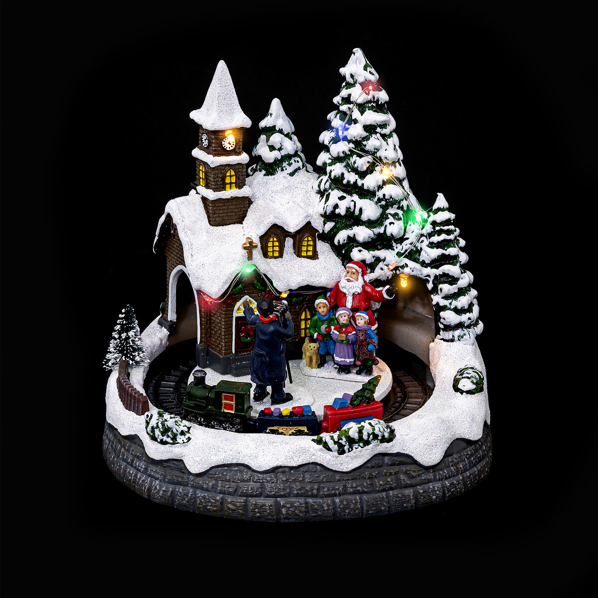 Aldeia natalícia luminosa com casa e túnel