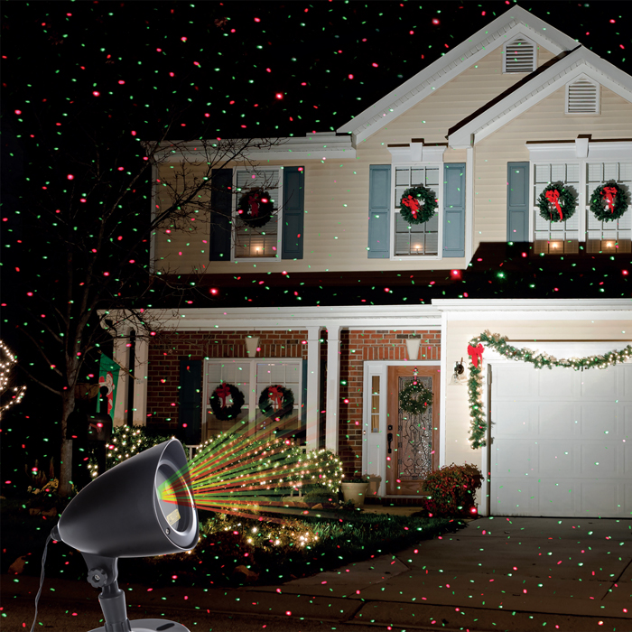 Projetor luminoso com feixes de luz verdes e vermelhos